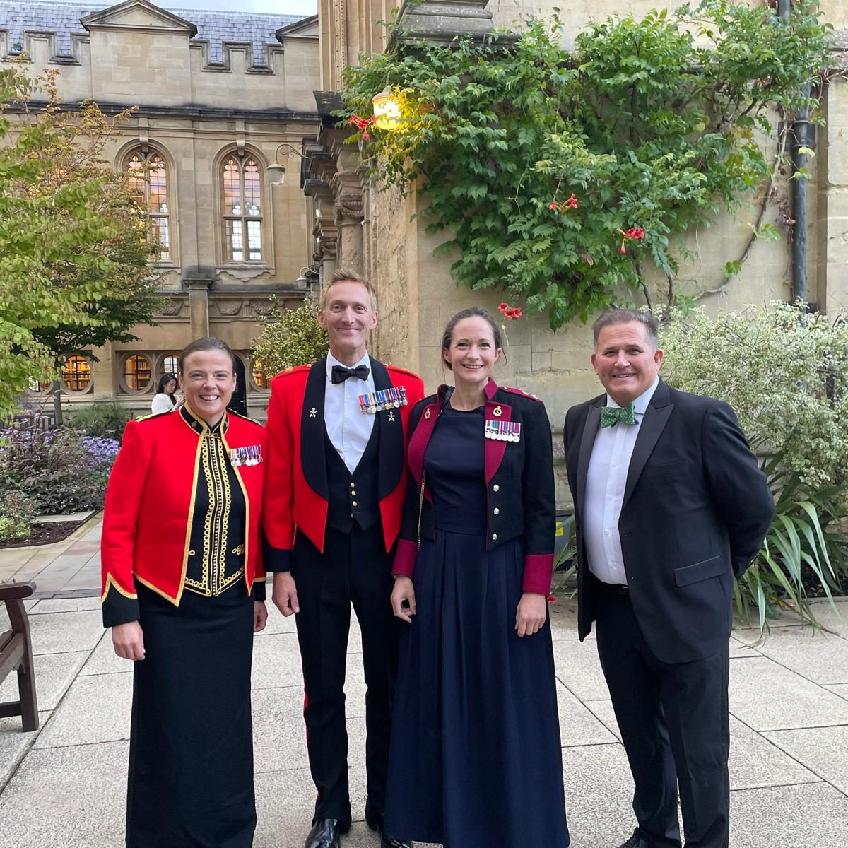 Shell in dress uniform at a military dinner night with friends and colleagues.
